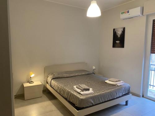 Ένα ή περισσότερα κρεβάτια σε δωμάτιο στο Appartament house