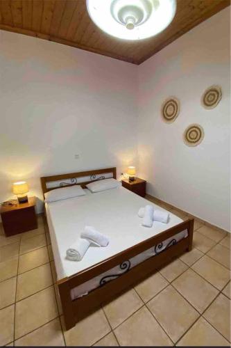 Katil atau katil-katil dalam bilik di Tania house , Loggos Paxos