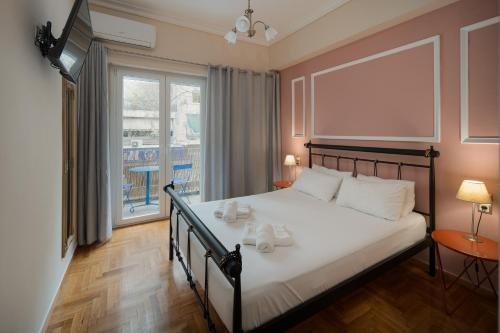 Posteľ alebo postele v izbe v ubytovaní Victoria Boutique Studios