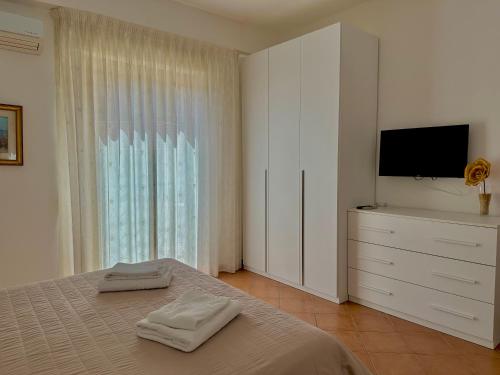Una cama o camas en una habitación de Hotel Soleado