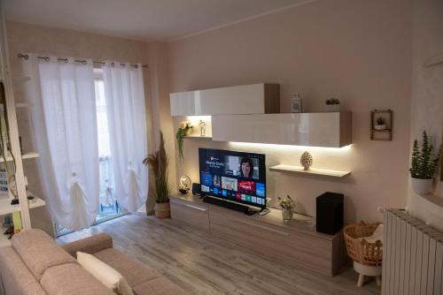 TV a/nebo společenská místnost v ubytování Casa Lucrezia - alla Torre