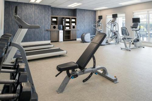 a gym with treadmills and cardio equipment in a room at Residence Inn by Marriott Jackson The District at Eastover in Jackson
