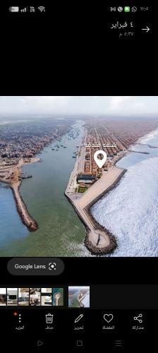 a television screen with a view of a river at شقة فندقية باجمل اطلاطه على البحر والنيل معا in Ras El Bar