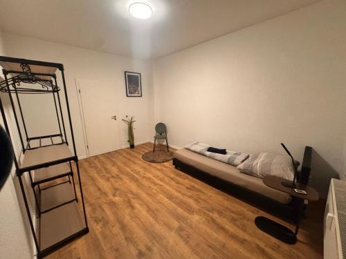 a bedroom with a bed and a ladder in it at A&V Apartments Arena Schalke in Gelsenkirchen