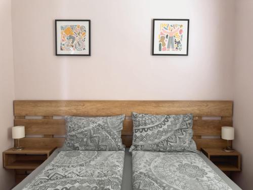 Katil atau katil-katil dalam bilik di Apartmani AquaMarine