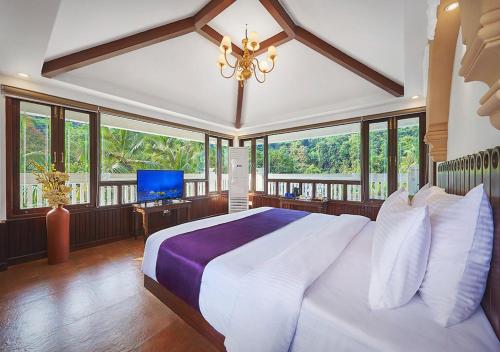 Postel nebo postele na pokoji v ubytování Ziva Suites - A Botique Hotel