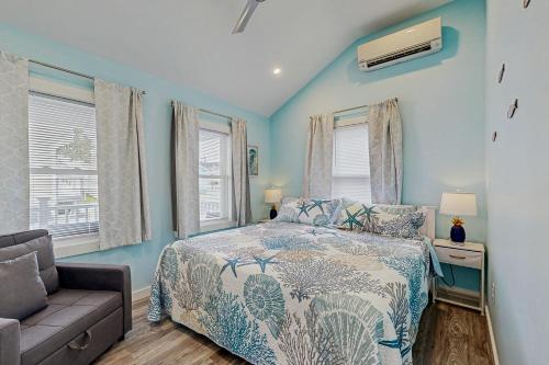 Ένα ή περισσότερα κρεβάτια σε δωμάτιο στο Parrot Bay 25