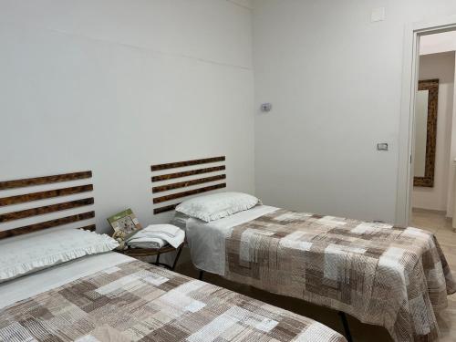 Ένα ή περισσότερα κρεβάτια σε δωμάτιο στο La casa di Anna