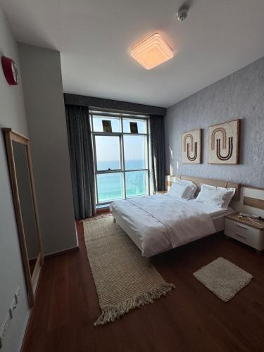Cama o camas de una habitación en Ocean View Luxury Suites