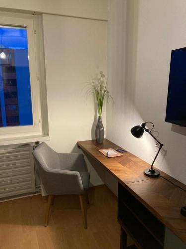 TV a/nebo společenská místnost v ubytování Appartement 1,5 pces