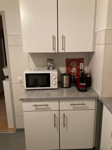 Kuchyň nebo kuchyňský kout v ubytování Appartement 1,5 pces