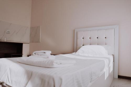 Katil atau katil-katil dalam bilik di New Hotel BEKARYS