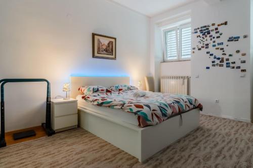 Postel nebo postele na pokoji v ubytování Work and Play Apartment