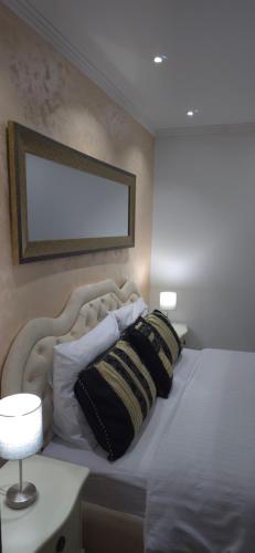 Postel nebo postele na pokoji v ubytování Wellness Villa Mantra Bačka Topola