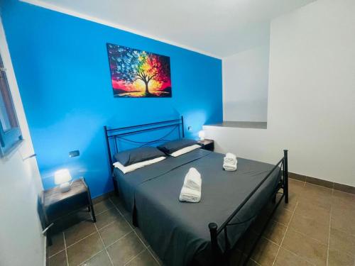 Postel nebo postele na pokoji v ubytování Casa vacanza ANIDA