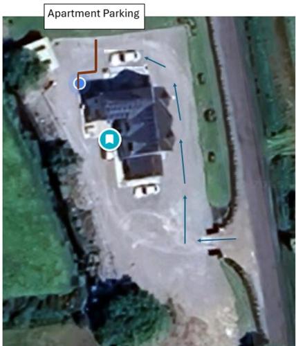 an aerial view of a parking lot with a car at Riveredge Apartment in Pedlars Cross Roads