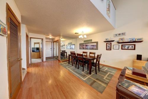 a dining room and living room with a table and chairs at Cannon Beach Condo Ocean Views ! Close to Beach! in Cannon Beach