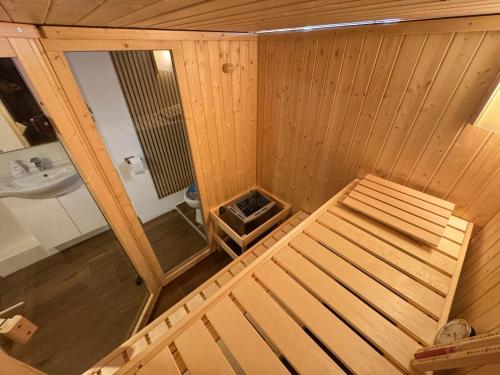 an overhead view of a bathroom with a sauna at Schöne Souterrain Wohnung in Herzogenrath mit Sauna! in Herzogenrath