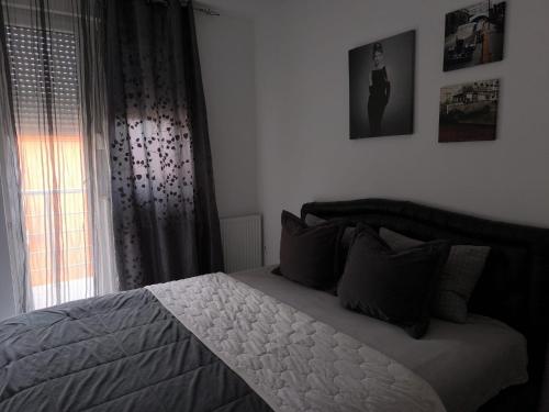 Una cama o camas en una habitación de Book home