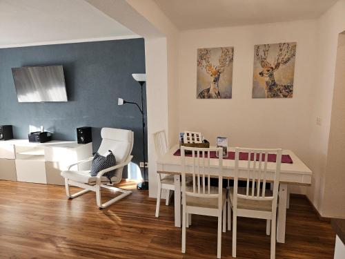 a kitchen and dining room with a table and chairs at Landhaus Klara in Neustift im Stubaital