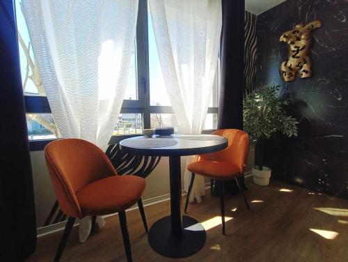 Χώρος καθιστικού στο Suite romantique - Jolies Courbes