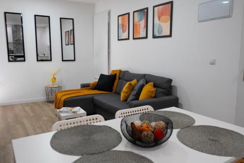 a living room with two tables and a couch at Zabas FLAT in Alboraya