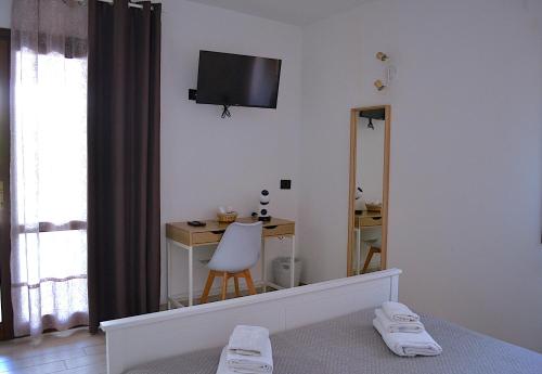 TV a/nebo společenská místnost v ubytování Zenia Rooms