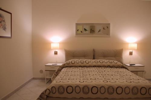 Postel nebo postele na pokoji v ubytování B&B Darsena