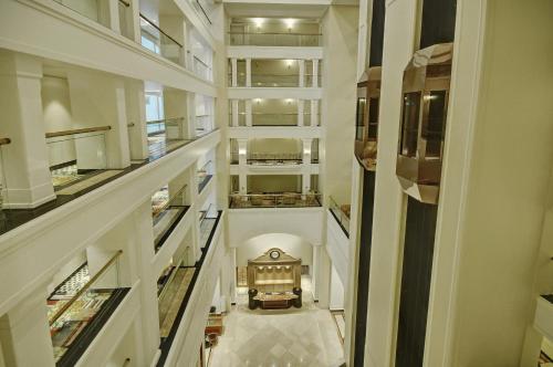 an overhead view of a hallway in a building at Lemon Tree Premier “The Atrium” Ahmedabad in Ahmedabad