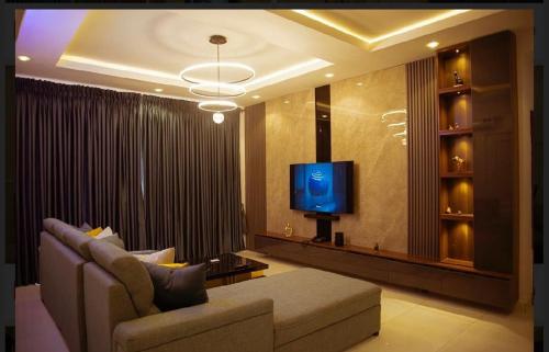 TV a/nebo společenská místnost v ubytování Lekki Lagos Apartment