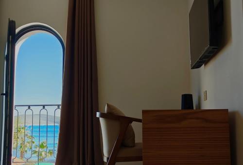 Μια τηλεόραση ή/και κέντρο ψυχαγωγίας στο VILLA MARGARIT Boutique Hotel