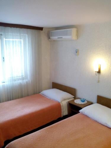 Apartmani sobe Matas