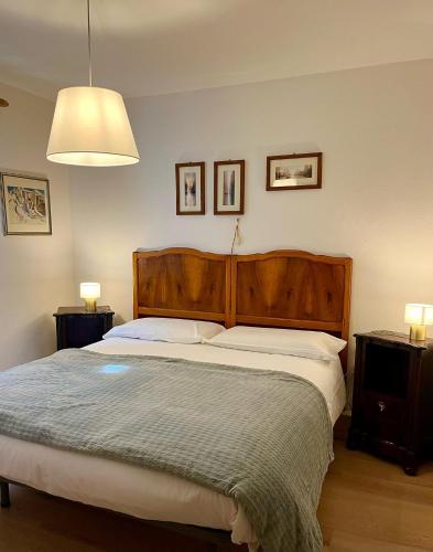 Ένα ή περισσότερα κρεβάτια σε δωμάτιο στο Casa di Charme sul Civetta Dolomiti
