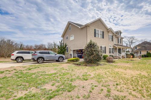 two cars parked in front of a house at 3 Mi to Shore Spacious Gem with Yard in Cape May in Cape May