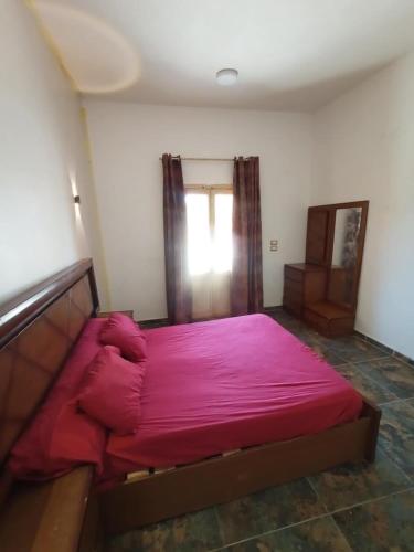 Кровать или кровати в номере noor house