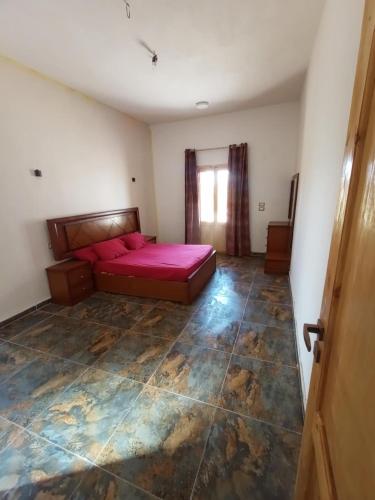 Кровать или кровати в номере noor house