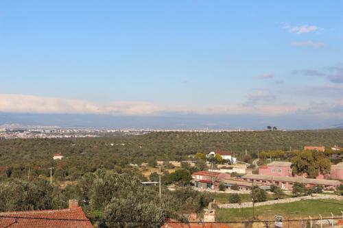 a view of a town with trees and buildings at Detached Stone Villa with Pool Sleeps 9 in Burhaniye