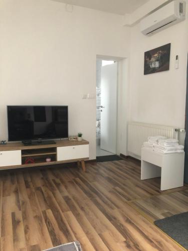 TV a/nebo společenská místnost v ubytování Graciaa