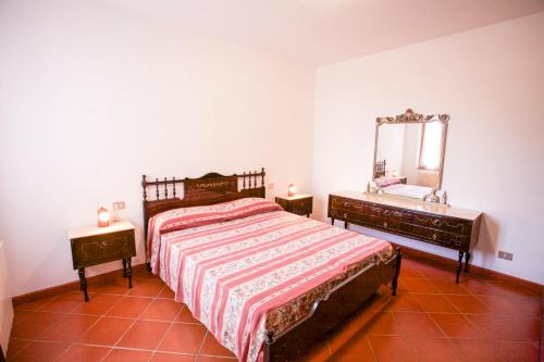 En eller flere senge i et værelse på Villino Mare e Natura