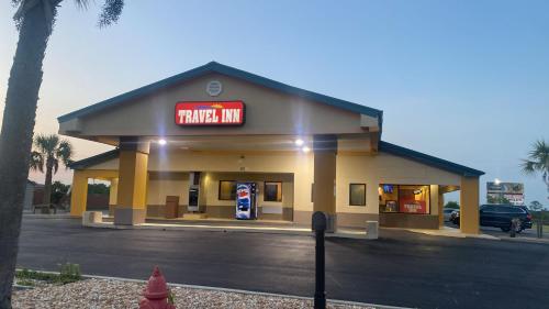 a pepsi max gas station with a sign on it at Travelinn in Unadilla