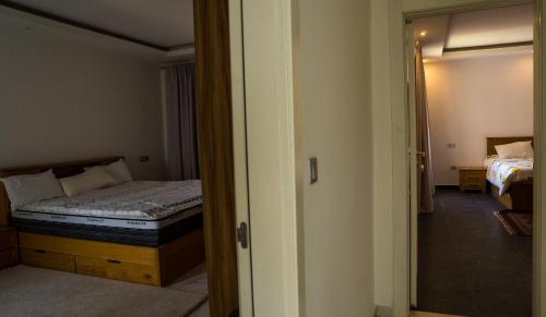 Кровать или кровати в номере Maison Sonéah