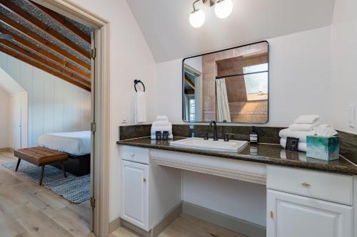 a bathroom with a sink and a mirror at The Marlo in Solvang