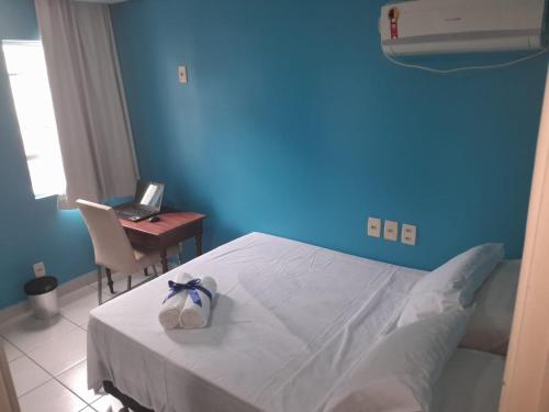 Postel nebo postele na pokoji v ubytování Hostel apart GUI Praia e Aeroporto