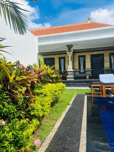 Imagen de la galería de Deni Guesthouse, en Tanah Lot
