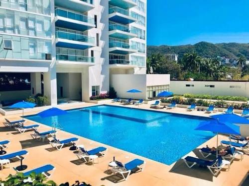 Πισίνα στο ή κοντά στο Departamento Acapulco ACQUALINA SKY LIFE