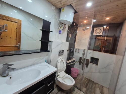 Koupelna v ubytování New Maya Home Stay