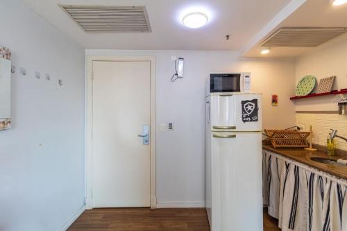 Η κουζίνα ή μικρή κουζίνα στο LFlats Hotel Oscar Freire