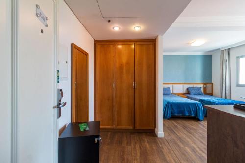 Ένα ή περισσότερα κρεβάτια σε δωμάτιο στο LFlats Hotel Oscar Freire