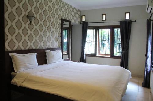 Afbeelding uit fotogalerij van Villa Rasamala in Sampal 2