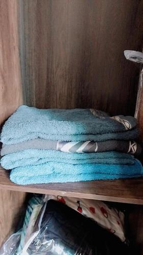 Katil atau katil-katil dalam bilik di Studio aconchegante prático acessível
